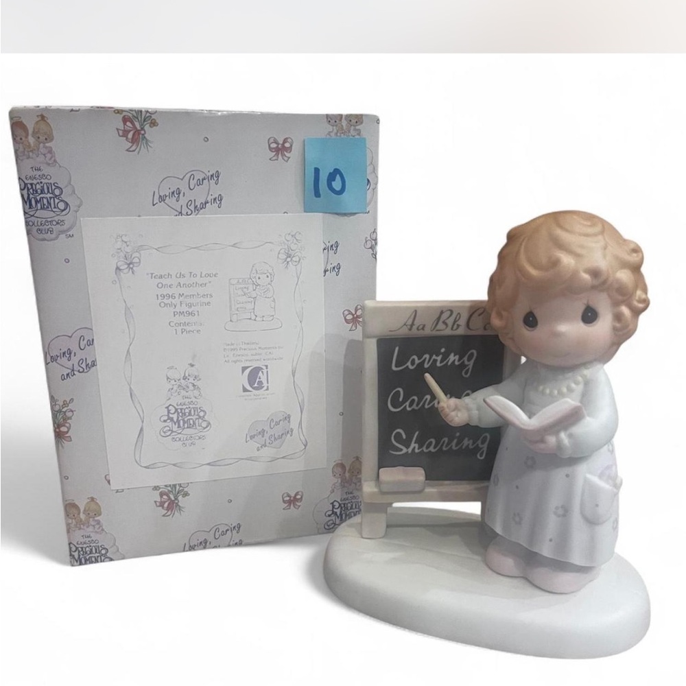 Precious Moments ‘Teach us to Love one Another’ Figurine in excellent condition